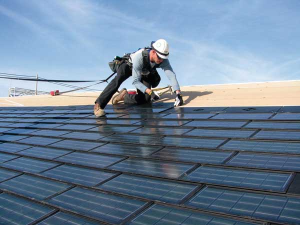 men installing roof