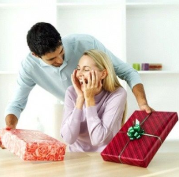 Girl receiving a gift from her boyfriend